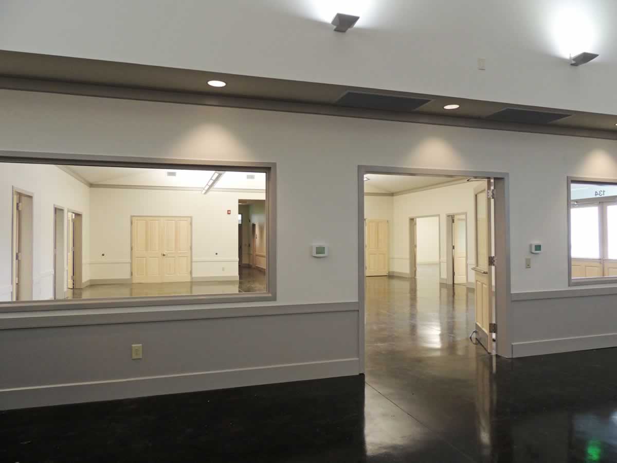 https://jmusselmanconstruction.com/wp-content/uploads/2020/08/6-entrance-area-from-church.jpg