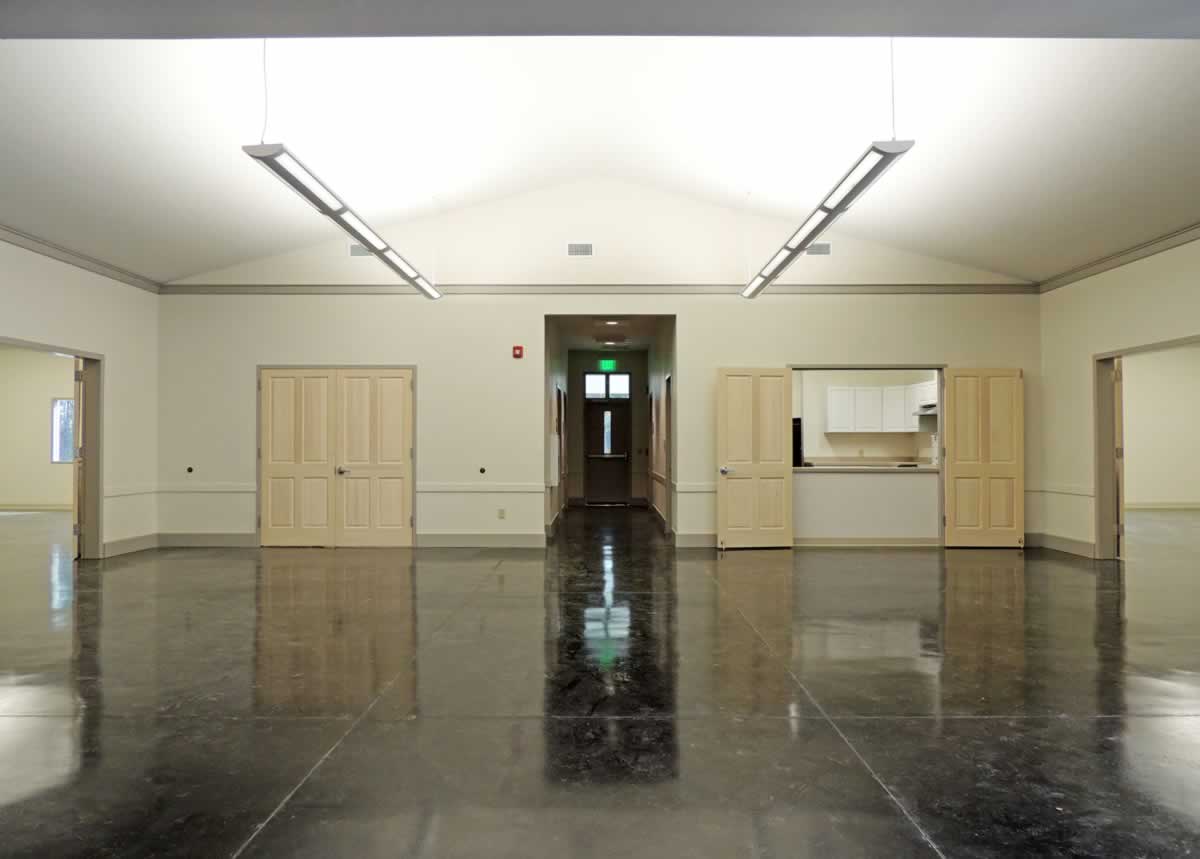 https://jmusselmanconstruction.com/wp-content/uploads/2020/08/7-foyer-to-kitchen-and-hall.jpg