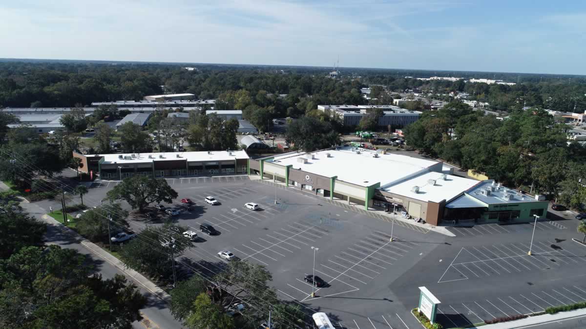 https://jmusselmanconstruction.com/wp-content/uploads/2020/08/8-Complete-shopping-center-sky-view-2-e1571162965960.jpg