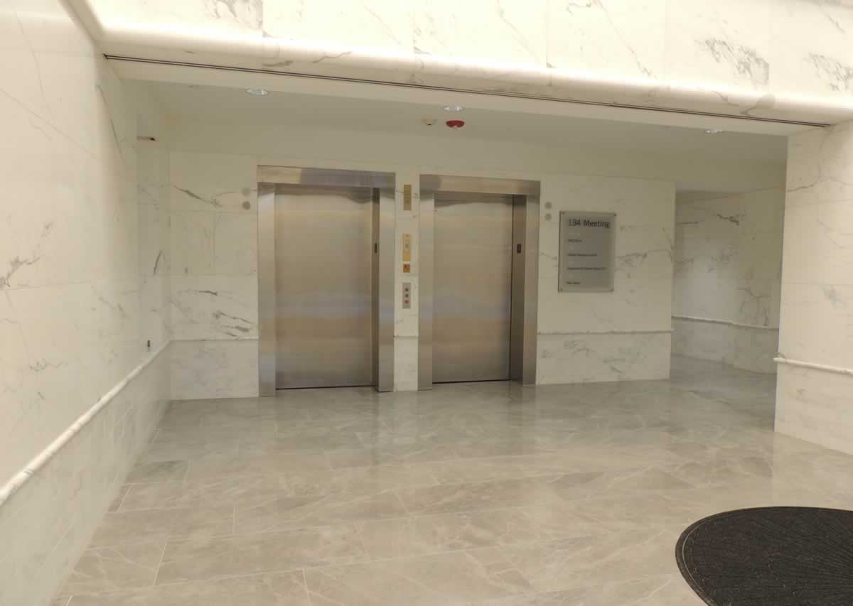 https://jmusselmanconstruction.com/wp-content/uploads/2020/10/Lobby-Elevators.jpg