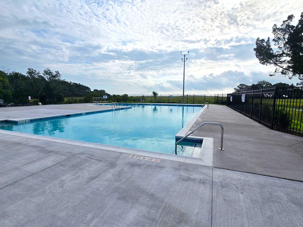 https://jmusselmanconstruction.com/wp-content/uploads/2025/07/Fort-Johnson-Estates-Pool-2.jpg